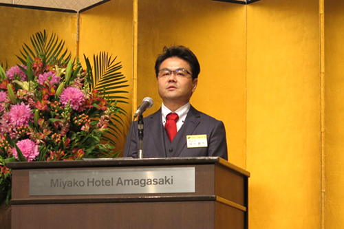 部会長に再任され、決意を語る細井氏